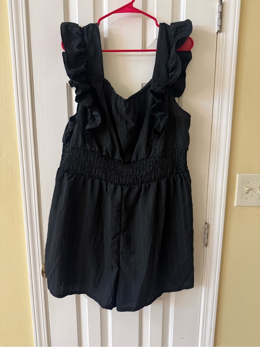SHEIN Black Ruffled Waist Smocked Romper